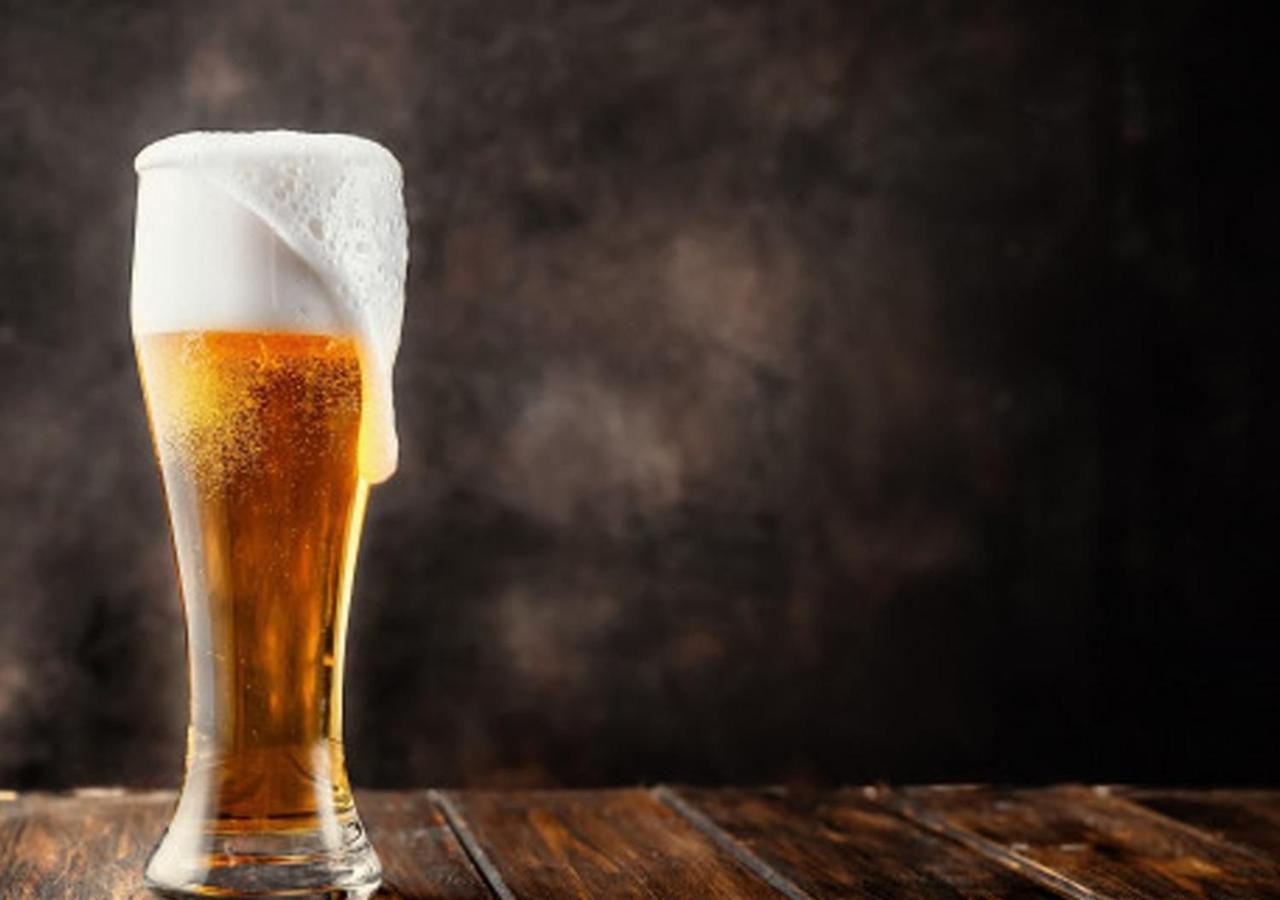 Hotel Emisia Sapporo Luaran gambar A glass of beer